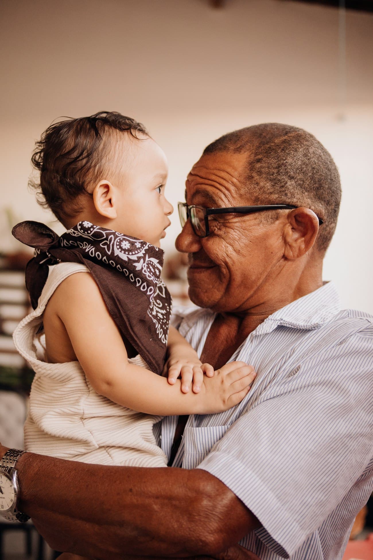 An elder and a young child together — generations side by side