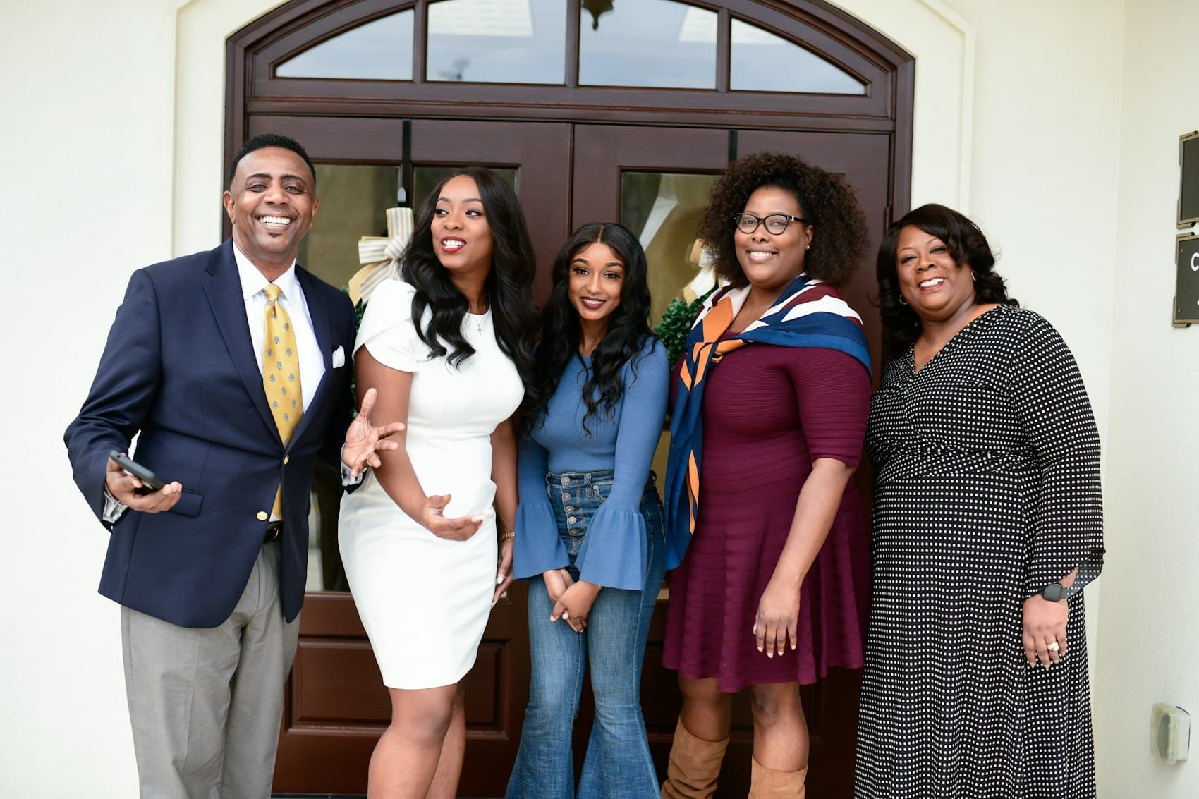 A joyful family standing together